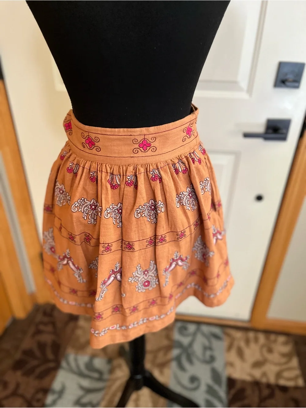 Anthropologie Meghan terracotta embroidered folkloric mini wrap skirt. Size 0